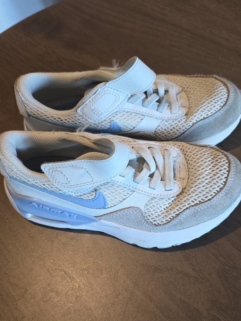 Nike Kids White Sneakers with Light Blue Swoosh Accent